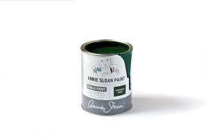 A tin of Annie Sloan Chalk Paint in a dark, forest gree
