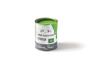 A tin of Annie Sloan Chalk Paint in a vibrant green colour