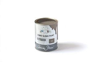 An open tin of light brown Annie Sloan Chalk Paint