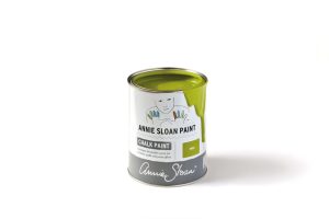 A tin of Annie Sloan Chalk paint in a vibrant green colour