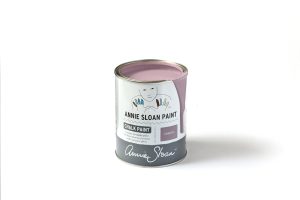 An open tin of Annie Sloan Chalk Paint in a dusky pastel pink colour