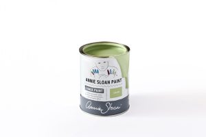 A tin of Annie Sloan Chalk Paint in a dusky lime colour