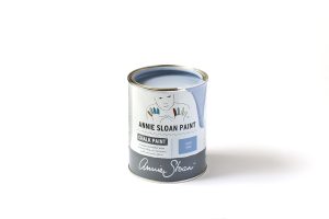 A tin of Annie Sloan Chalk Paint with a soft pastel blue colour