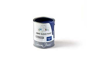 A tin of Annie Sloan Chalk Paint in a deep, ultramarine blue colour
