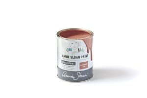 An open tin of Annie Sloan Chalk Paint in a dusky salmon pink