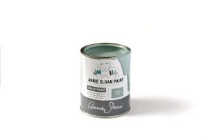 A tin of Annie Sloan Chalk Paint in a dusky light blue tone