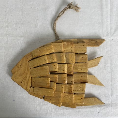 A rustic fish made of driftwood with hessian hanging string.
