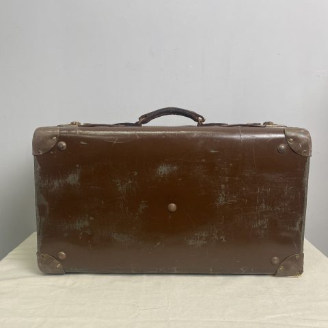 A vintage brown leather suitcase