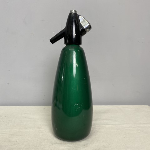 A vintage green anodised soda syphon