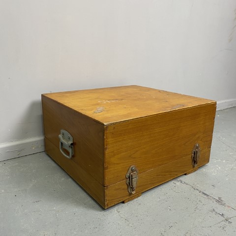 A vintage timber storage box with lift off lid