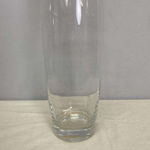 A tall glass vase