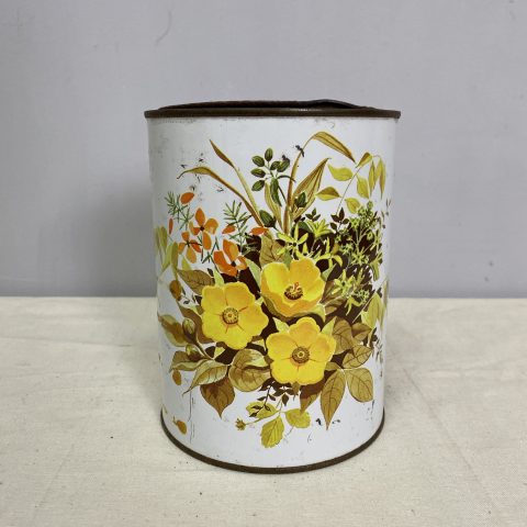 A retro kitchen tin with floral design