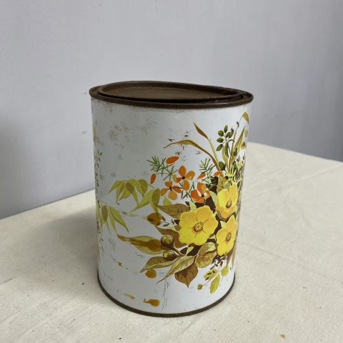 A retro kitchen tin with floral design