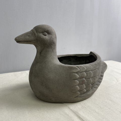 A grey duck planter