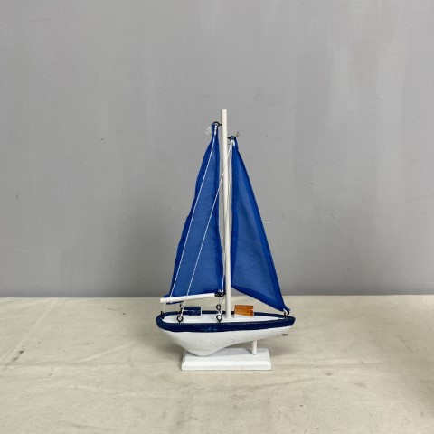 Small Coastal Blue Sailing Boat