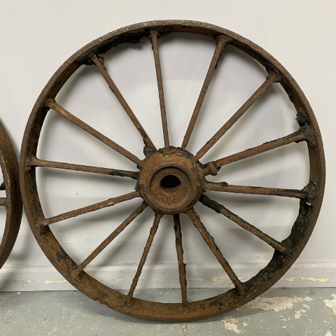 Pair of Rustic Cast Iron Wagon Wheels