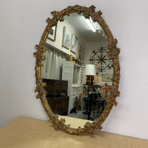 Antique Carved Timber Oval Golden Mirror with delicate flowers all around frame