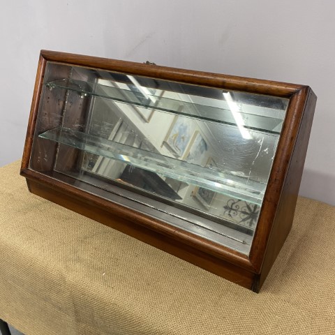 Antique Counter Top Display Case with mirrored back and glass shelves