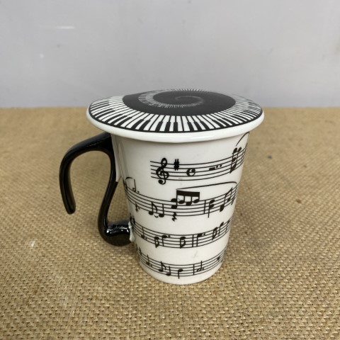 Sheet Music Ceramic Mug with semi quaver handle and piano key swirl lid