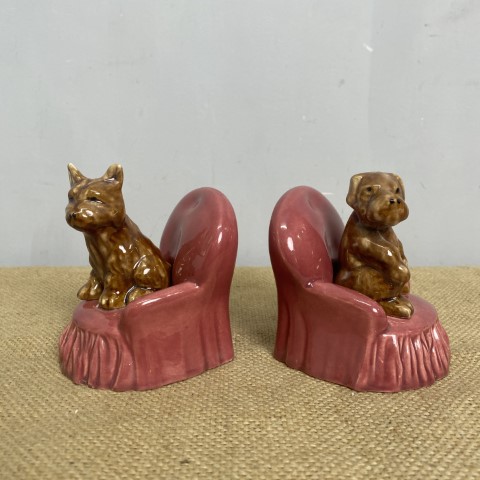 Pair of Vintage Ceramic Lyndale Moss Dog Bookends - dogs sitting on pink armchairs