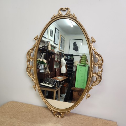 Gold Ornate Oval Mirror in French Provincial Style
